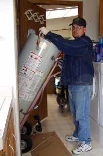 Coppell plumbing associate installs a residential 50 gallon water heater