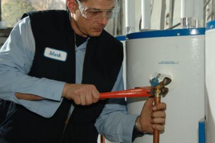 Coppell plumbing contractor repairs a water heater intake line